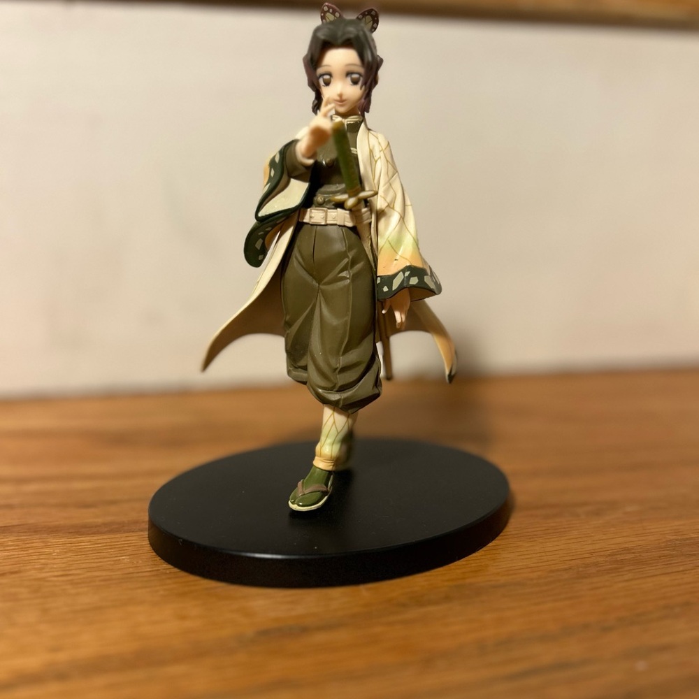 Anime Character Figurine in Green and Cream
